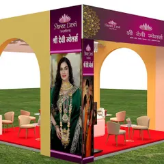 This is a 3D visualization for an exhibition stall for Shree Devi Jewellers. The design uses grand arches and a bold color scheme to attract visitors, with a layout that includes comfortable seating and secure display counters for a high-end experience.