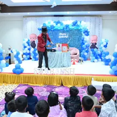 Performing on a 'Boss Baby' themed stage for a first birthday party. No matter the theme, I bring the energy and wonder to make the celebration special.
