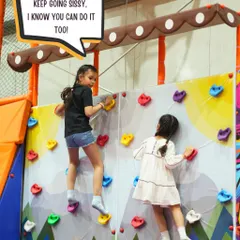 Our colorful rock climbing wall is perfect for kids of all skill levels. It's wonderful to see them build confidence and strength, with our trained staff always nearby to supervise and assist.