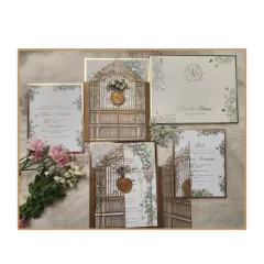 A full view of our fairytale gatefold suite, including the main laser-cut invitation, the RSVP card, and a custom monogrammed envelope. Every piece is designed to work together to create a cohesive and enchanting story.