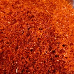 A close-up of my freshly made Kobbari Karam (coconut spice powder). This podi is a perfect mix of dry coconut, Guntur chillies, and spices, ideal for sprinkling on hot rice with a dollop of ghee.