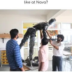 What does sustainability look like at Nava? It's a mindset. Here, our team works on a life-sized sculpture made from discarded materials, turning waste into a meaningful creation.