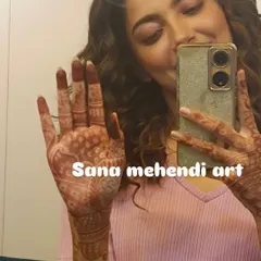 A happy client taking a selfie to show off her beautiful mehendi stain. I love seeing my clients so pleased with the results.