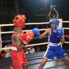 An action shot from the memorial tournament. Our boxers get regular opportunities to compete and showcase their skills in the ring.