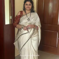 A happy client, Gowthami, looking lovely and ready for her Onam celebration. A simple, elegant drape for a joyous occasion.
