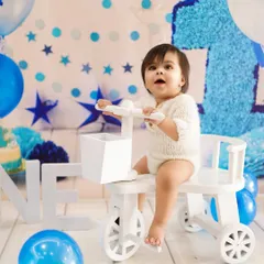 Twinkle, twinkle, little star, how loved you are. A blue and white star-themed first birthday shoot for a special little boy.