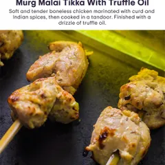 Soft and tender boneless chicken marinated with curd and Indian spices, then cooked in a tandoor and finished with a drizzle of truffle oil for a touch of luxury.