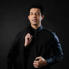 This is my go-to professional headshot. The all-black, suited look is versatile and perfect for corporate, formal, or upscale brand campaigns.