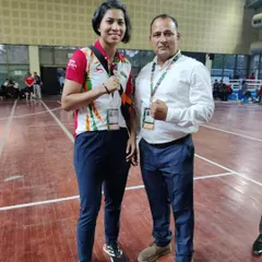 Pictured here with world-class boxer Lovlina Borgohain. Being connected to the elite level of the sport helps me bring the best techniques and insights to my own students.