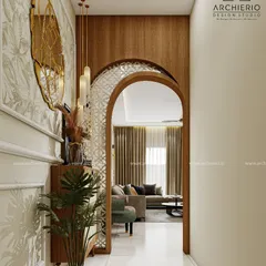 This view shows the foyer leading into the living room through a beautiful wooden archway, giving a grand sense of arrival.