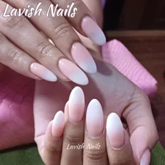 A beautiful baby boomer ombre on long, almond-shaped nails, showcasing a soft and natural-looking gradient.