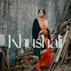 An artistic and unconventional bridal portrait, placing the bride in her traditional Nauvari against a rustic, deconstructed background.
