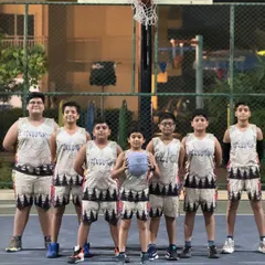 This group is ready to hit the court in their matching Warriors team uniforms.