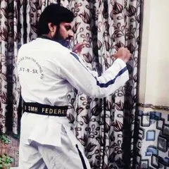 In my uniform, ready to train. The black belt is not just a piece of cloth, it is a symbol of years of sweat, discipline, and mastery.