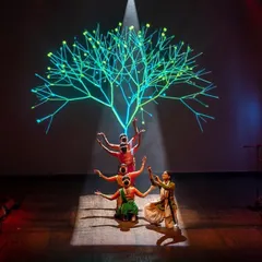 From my production 'Antariksha Sanchar', this scene uses digital art to create a celestial tree of life. My choreography often integrates such visual elements to build immersive worlds on stage, blending ancient stories with futuristic aesthetics.