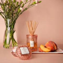 Transform your bathroom into a mini-retreat with our Peach Bellini reed diffuser and matching crystal candle. The sweet, fruity fragrance creates a spa-like atmosphere, and the beautiful jars add a touch of elegance.