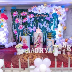 A magical Barbie and mermaid themed first birthday setup, featuring pastel balloons and enchanting decor. We ensure your vision for a themed party is beautifully documented.