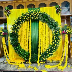 A well-lit photo of the Haldi stage, ready for the ceremony to begin.