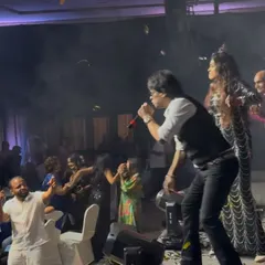 The crowd reaches out as I sing from the edge of the stage. I love this close connection with my audience.