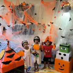 Spooky season is here! Our studio gets a full Halloween makeover with spiderwebs, bats, and friendly ghosts. These little ones are all dressed up and ready for some spooky art fun.