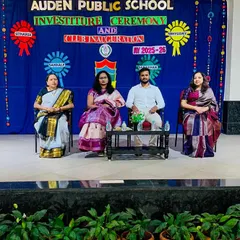 On stage with the faculty at Auden Public School. Sharing my journey is my way of giving back to the community and inspiring young minds.