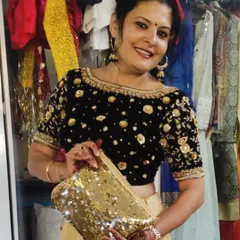 For my brother's sangeet, I designed this black velvet blouse with rich zardozi and sequin embroidery. I paired it with a flowing soft silk lehenga to create a look that's both regal and ready to dance.
