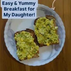 An easy and yummy breakfast I make for my daughter in under 5 minutes. It's a simple spread of boiled corn and peas blended with nutritional yeast on whole wheat bread.