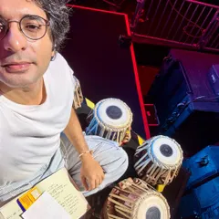 A backstage selfie during a moment of quiet before the show. Here I am with my tablas and my notes, getting into the zone to perform for the NBA event.