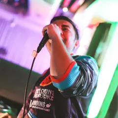It's not just about playing music; it's about leading the party. Here I am on the mic, hyping the crowd and making sure everyone feels the beat. This is how I connect with your guests.