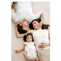 A quiet moment of connection. I arranged this family for an overhead shot to create a beautiful, intimate portrait that focuses entirely on their bond and the love that holds them together.
