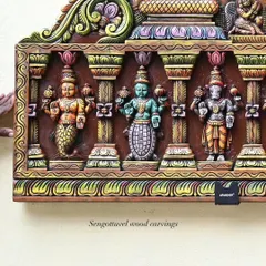 A close-up of the painted Dasavatharam panel, showing the Matsya, Kurma, and Varaha avatars. The careful color selection and fine brushwork are evident in each figure.