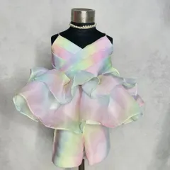 The full view of our Rainbow Co-ord set on a mannequin, showcasing the structured yet airy design of the ruffled top and the comfortable matching shorts.