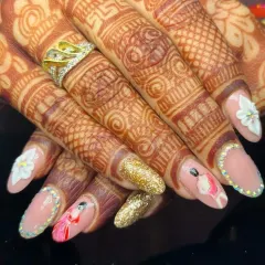 Another view of the stunning bridal set, showing how each nail tells a part of the story with unique, intricate details.