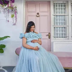 Our Santorini-inspired setup, featuring a charming pink door and white-washed walls. It's a perfect backdrop for our fairytale gowns.