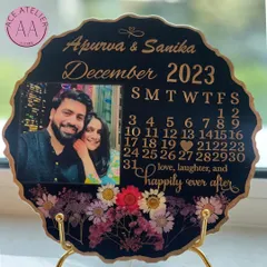 A close up of a beautiful anniversary calendar frame. I use high quality materials to ensure every detail, from the names to the custom quote, is perfectly captured.