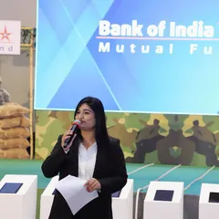 A wider view of the stage setup for the Bank of India product launch, showing a professional and branded environment.