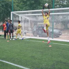 A great save in action during our specialized goalkeeper trials. We look for keepers who command their area and have the agility to make crucial stops.