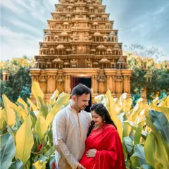 Blending tradition with the miracle of new life, we captured this couple's special journey. This maternity portrait, taken in front of a beautiful temple, honors their cultural roots while celebrating the love that builds a family.