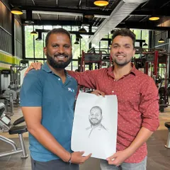 Hero Item. There's no greater feeling than seeing a client's smile when they receive a piece of art made just for them. This is why I do what I do, turning moments into timeless charcoal portraits.