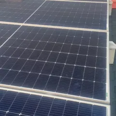 A closer look at the solar array. We ensure that all sustainable features are integrated seamlessly into the architectural design, proving that green living can be stylish.