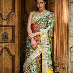 Here is one of my favorite Pen Kalamkari sarees, worn to show its true artistic flair. The fabric becomes a canvas for mythological stories, hand-painted with natural dyes. This saree is a piece of wearable art, blending traditional craft with contemporary style.