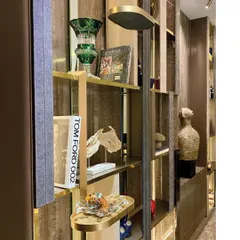 Even functional shelving can be a source of light. We integrated lighting into this custom bookshelf, turning it into a beautiful display for books and artifacts while adding a warm glow to the room.