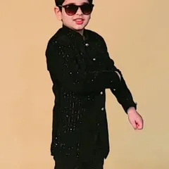 Confidence and style from one of our young male models in the kids' category.