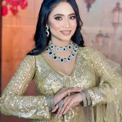 A beautiful portrait of the finished engagement look. The makeup is elegant and sophisticated, featuring a neutral color palette with a touch of shimmer.