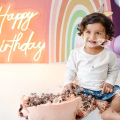 The pure joy of a first birthday cake smash! This little one is having the best time with her rainbow-themed celebration. I love capturing these messy, happy, and unforgettable moments.