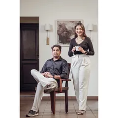 A portrait of my co-founder and me. We believe that while our work is serious, the process should be enjoyable. This was our first photoshoot together, and it was a challenge to keep a straight face!