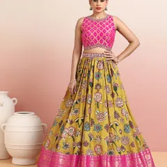 The model's confident pose perfectly captures the spirit of this modern-traditional lehenga. It is a piece that is both playful and elegant.