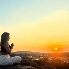 A moment of quiet gratitude at sunrise. This image captures the essence of my practice: connecting with nature, honoring the light within, and finding peace in stillness. This is the feeling I hope to share with you.