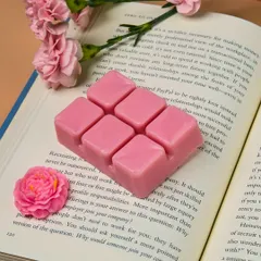 A close-up of my pink wax melt bar. I make these with non-toxic ingredients and gentle fragrances, so you can enjoy the scent without any worries.