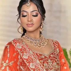 A slightly different angle showing the soft, glowing makeup that I pair with my jewellery. The focus remains on the intricate design of the gold-plated Kundan necklace and tikka.